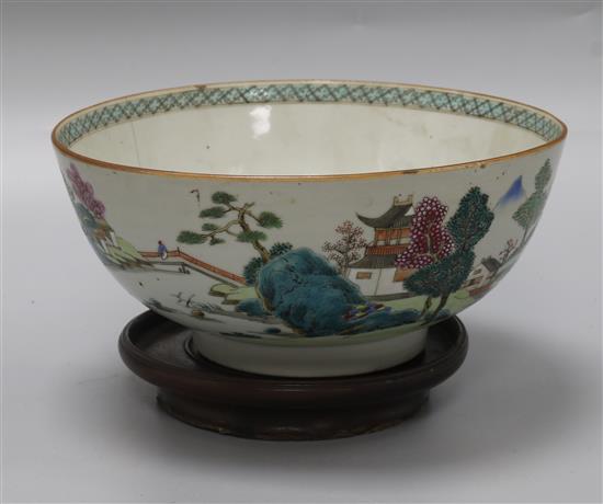 A Chinese famille rose landscape bowl, Qianlong period, diameter 20.2cm, rim crack